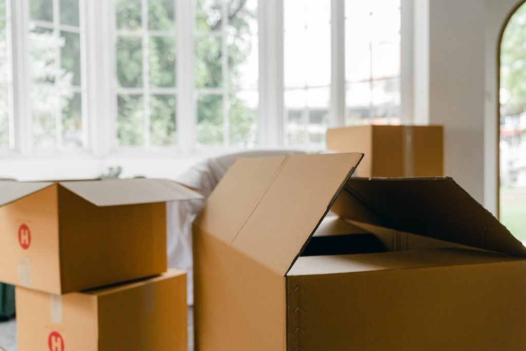 Open Cardboard Moving Boxes in a Bright Home Interior